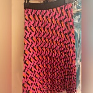 Super cute skirt! I don’t remember the brand- I got it from a boutique.